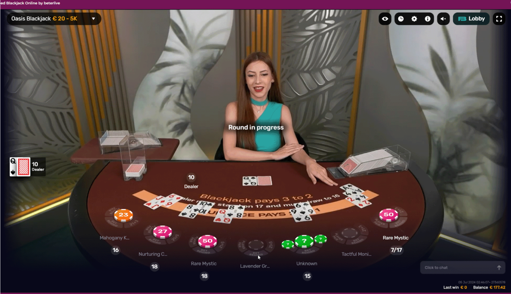 Screenshot of casino showcasing blackjack table with dealer